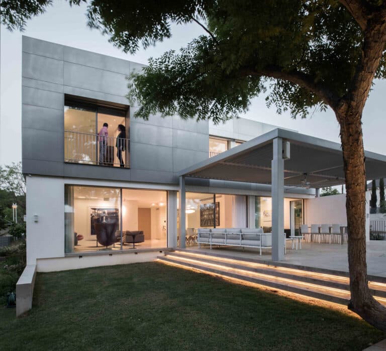 luxurious white and grey home with big glass windows