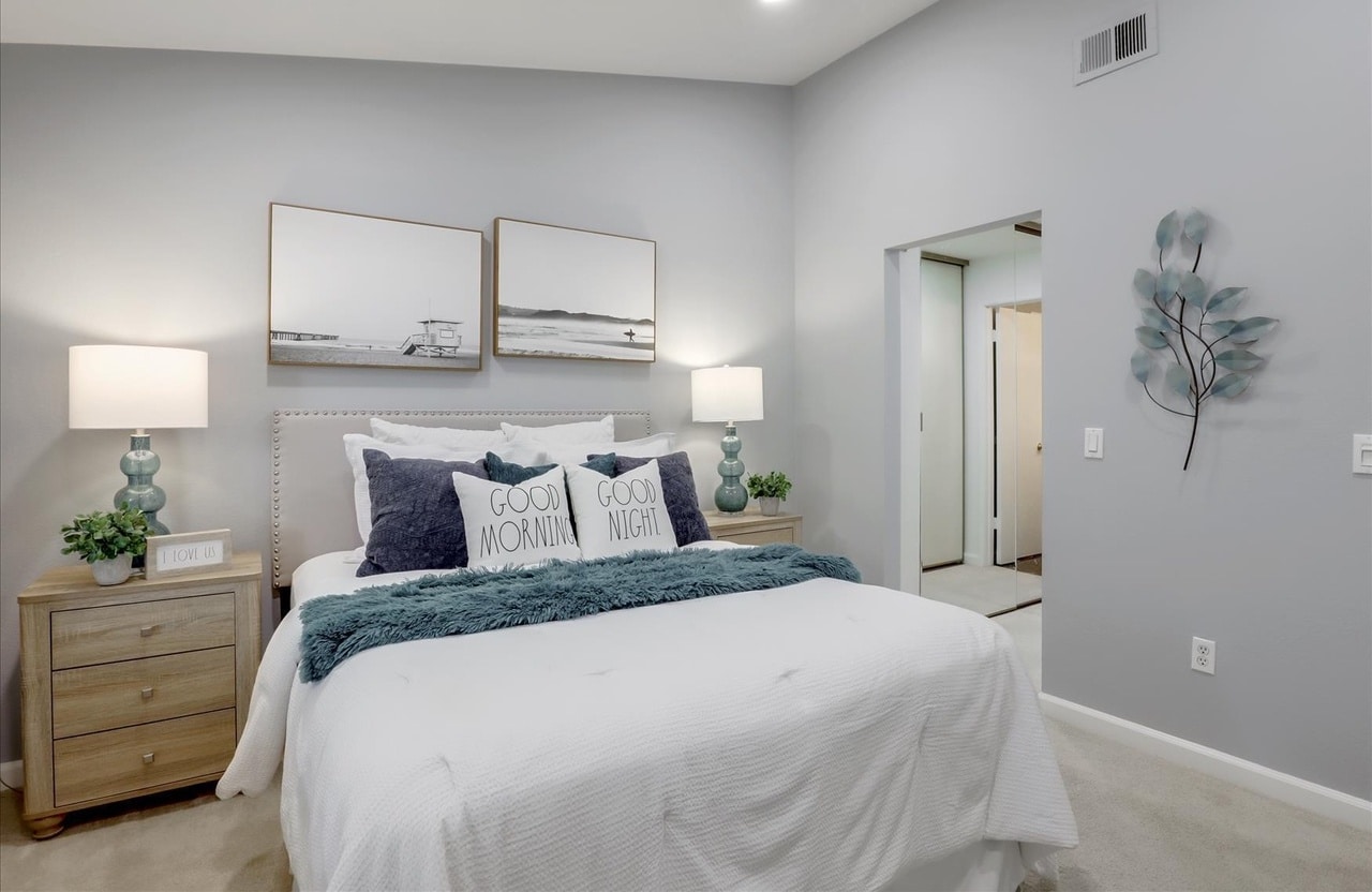 Bright newly renovated bedroom with updated flooring, walls, and fixtures