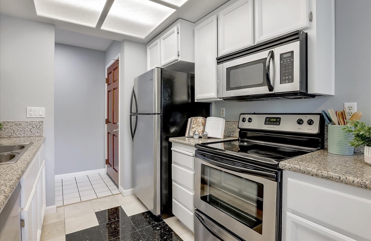 Newly refreshed kitchen in an Orange County condo remodel by Denali Builders & Design, showcasing