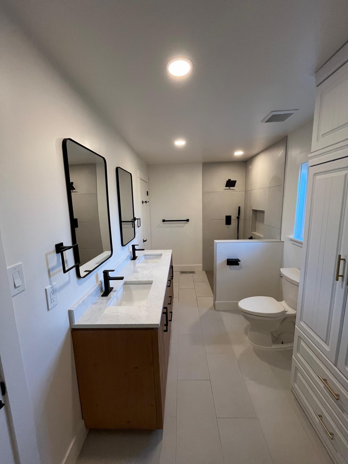 Bathroom with double sinks and mirrors