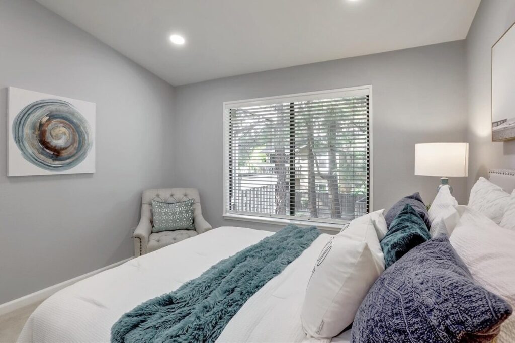 Newly renovated bedroom with modern finishes and updated furnishings