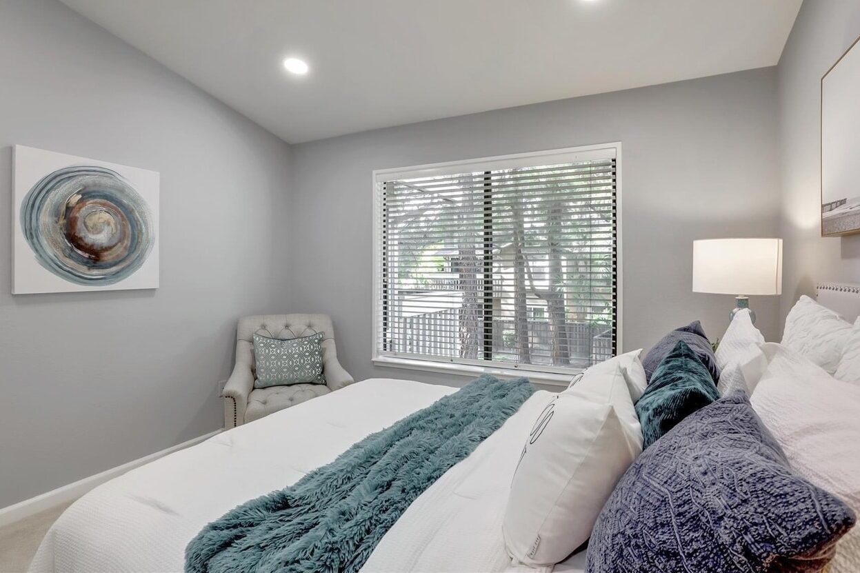 Newly renovated bedroom with modern finishes and updated furnishings