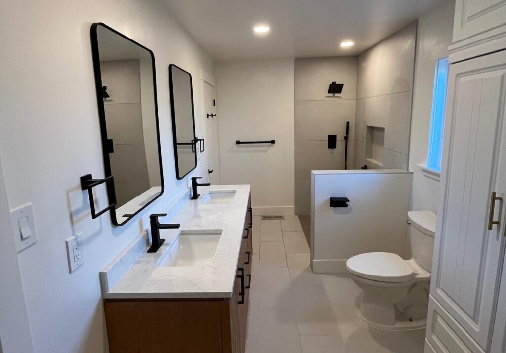 Bathroom with double sinks and mirrors